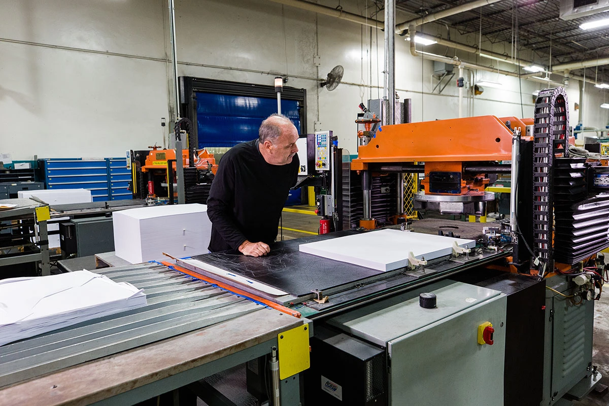 Employee Reviewing Print Quality