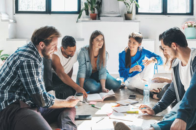people-sitting-on-wooden-floor Our wide format team has more than 23 years in the industry